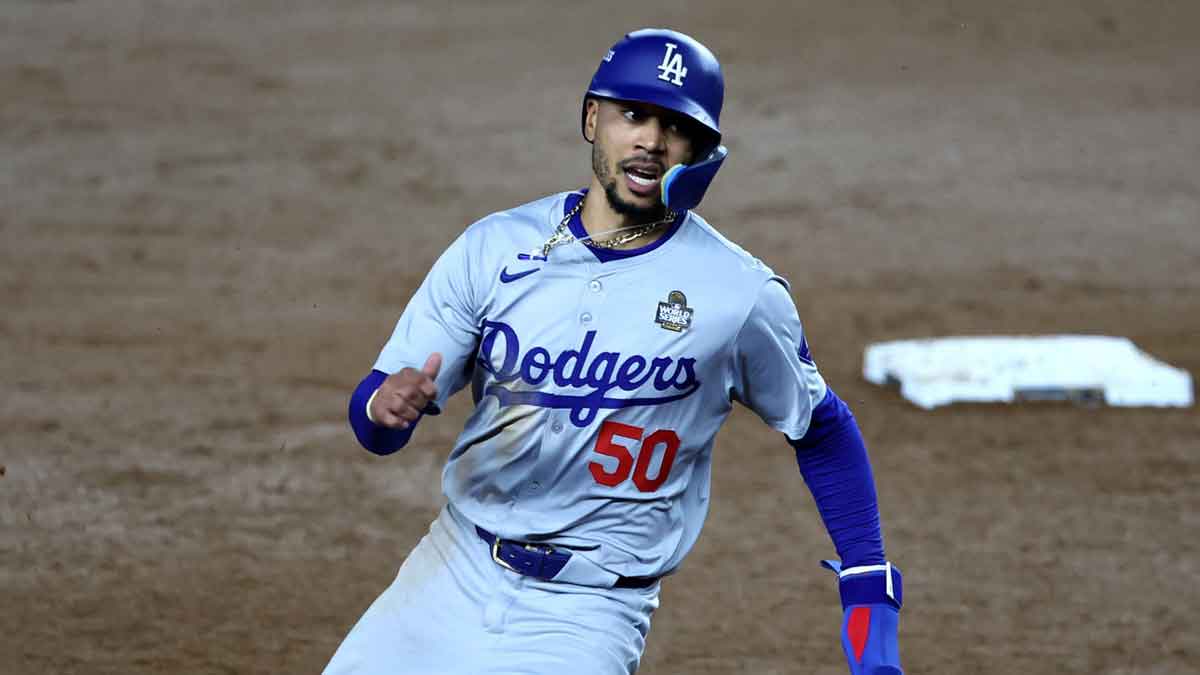 Los Angeles Dodgers shortstop Mookie Betts (50) runs to third during the fifth inning against the New York Yankees in game five of the 2024 MLB World Series at Yankee Stadium.