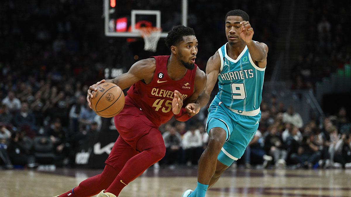 Cleveland Cavaliers guard Donovan Mitchell (45) drives to the basket against Charlotte Hornets guard Theo Maledon (9) during the second half at Rocket Mortgage FieldHouse.