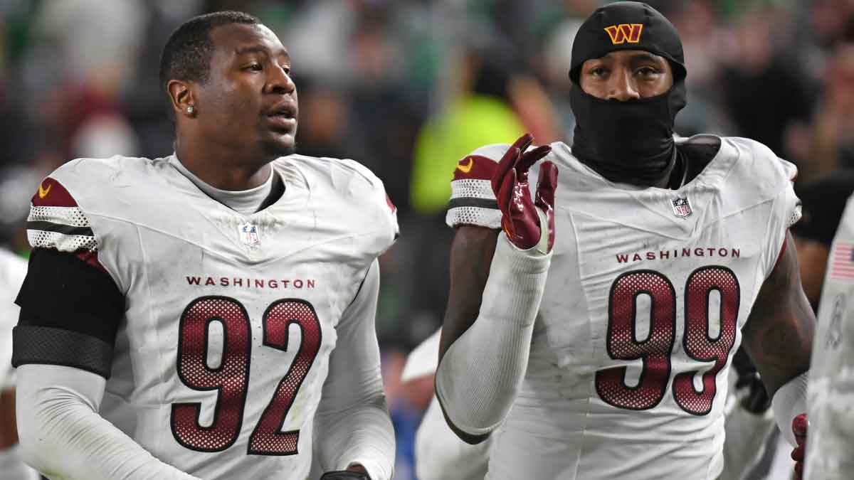 Washington Commanders defensive end Dorance Armstrong (92) and defensive end Clelin Ferrell (99) against the Philadelphia Eagles at Lincoln Financial Field.