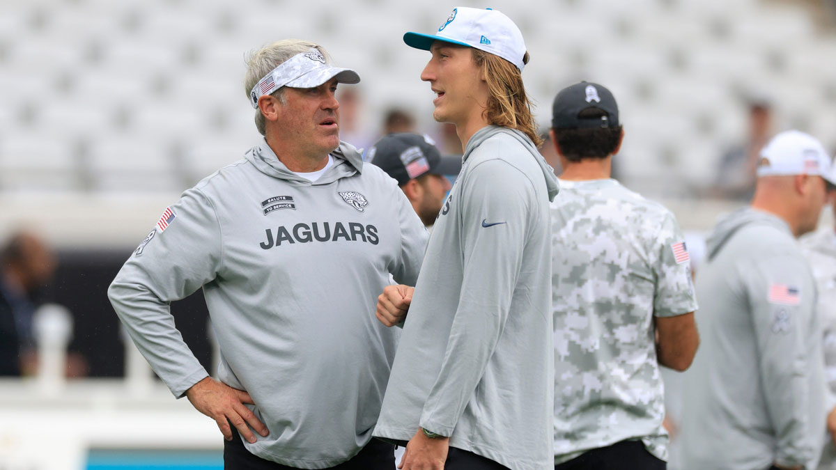 Jacksonville Jaguars quarterback Trevor Lawrence (16) talks to head coach Doug Pederson before an NFL football matchup Sunday, Nov. 10, 2024 at Everbank Stadium in Jacksonville, Fla. [Corey Perrine/Florida Times-Union]