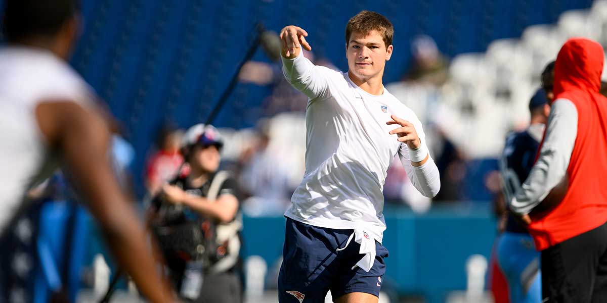 New England Patriots quarterback Drake Maye (10) warms up before a game against the Tennessee Titans at Nissan Stadium.
