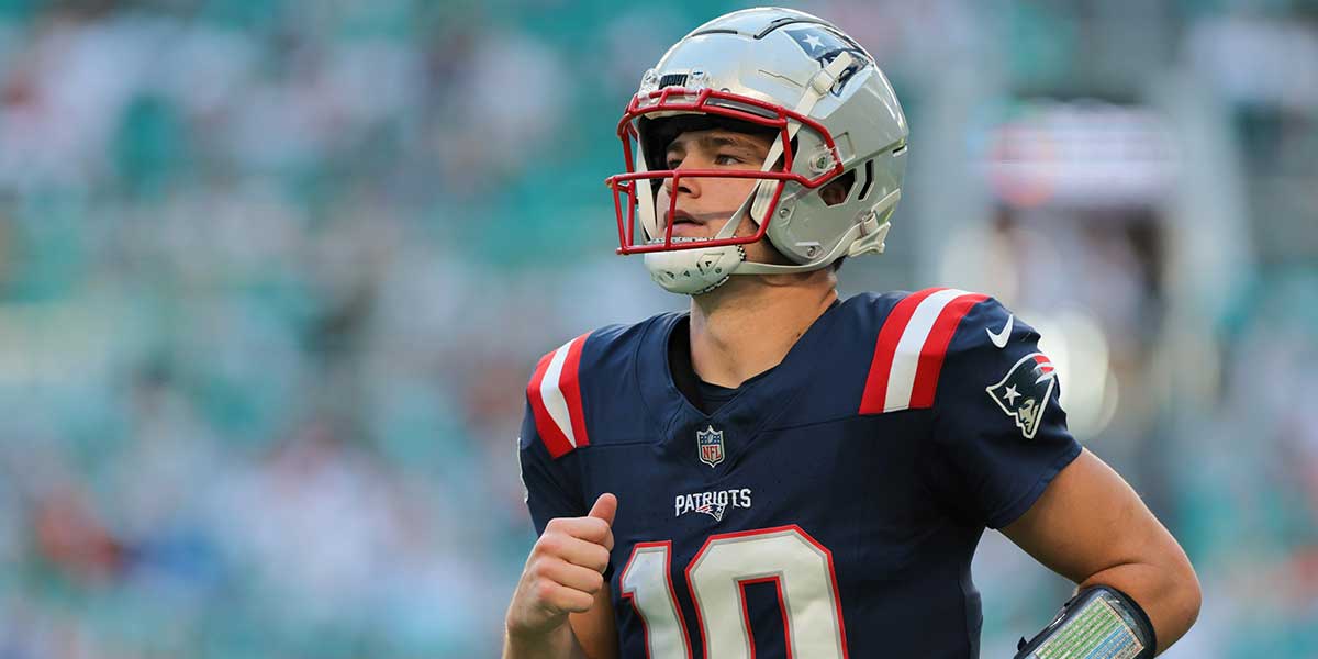 New England Patriots quarterback Drake Maye (10) looks on against the Miami Dolphins during the fourth quarter at Hard Rock Stadium.
