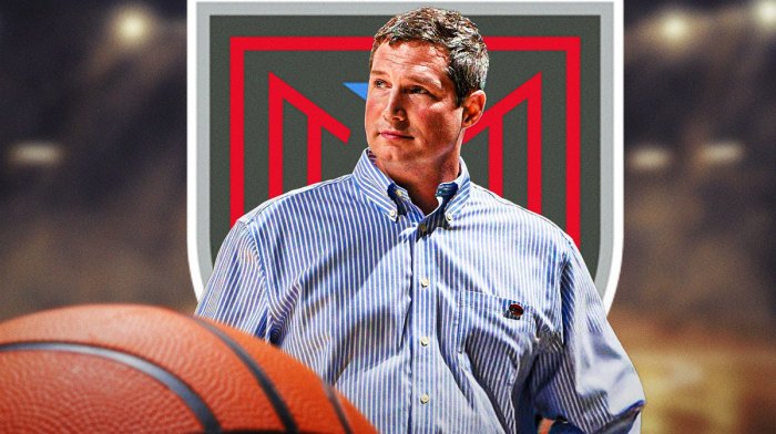 Karl Smesko next to a Atlanta Dream logo.