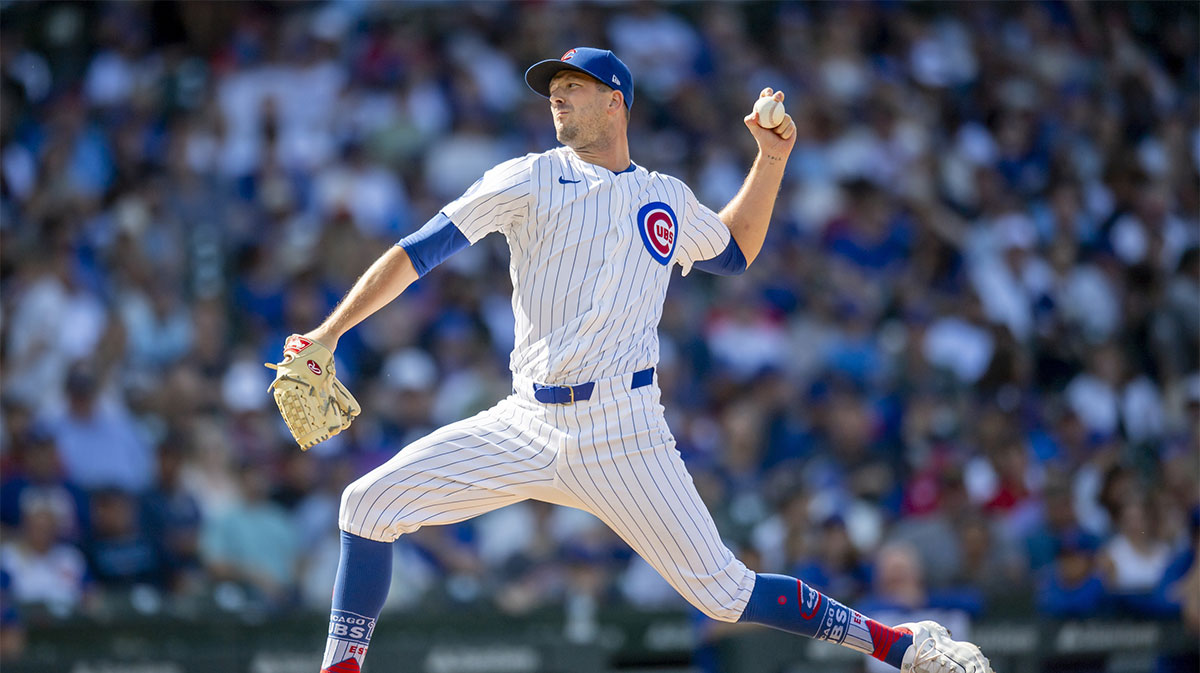 Aug 17, 2024; Chicago, Illinois, USA; Chicago Cubs relief pitcher Drew Smyly (11) pitches during the seventh inning against the Toronto Blue Jays at Wrigley Field. 