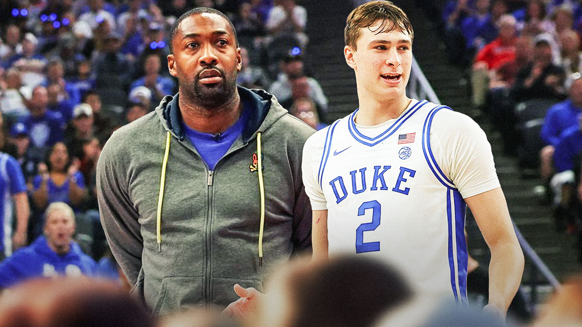 Gilbert Arenas beside Cooper Flagg wearing Duke gear.