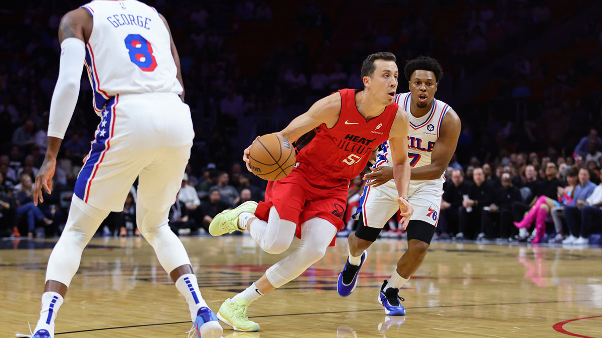 Miami Heat forward Duncan Robinson (55) drives to the basket past Philadelphia 76ers guard Kyle Lowry (7) during the first quarter at Kaseya Center. 