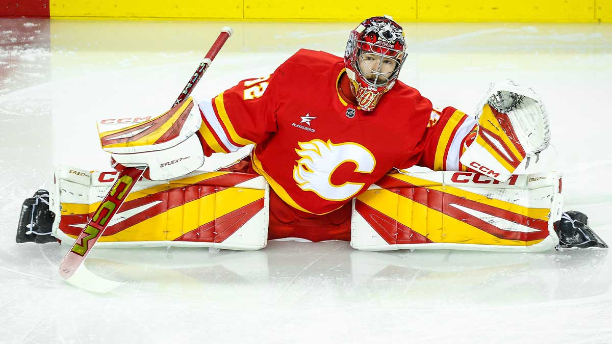 Calgary Flames goaltender Dustin Wolf (32) during the warmup period against the Nashville Predators at Scotiabank Saddledome.