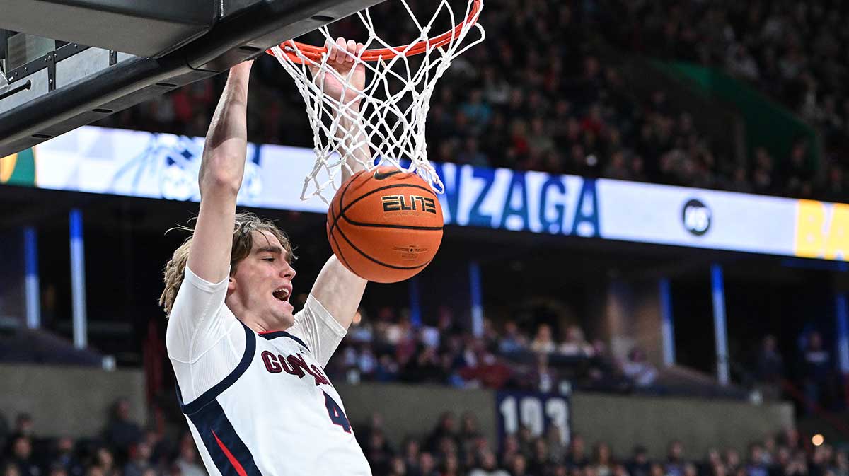 Gonzaga Bulldogs guard Dusty Stromer (4) dunks against the Baylor Bears in the second half at Spokane Arena. 