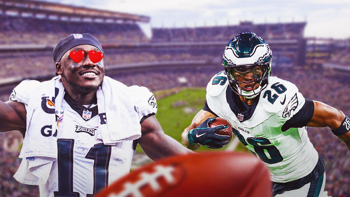 Photo: AJ Brown smiling with heart eyes looking at Saquon Barkley in action, both in Eagles jerseys