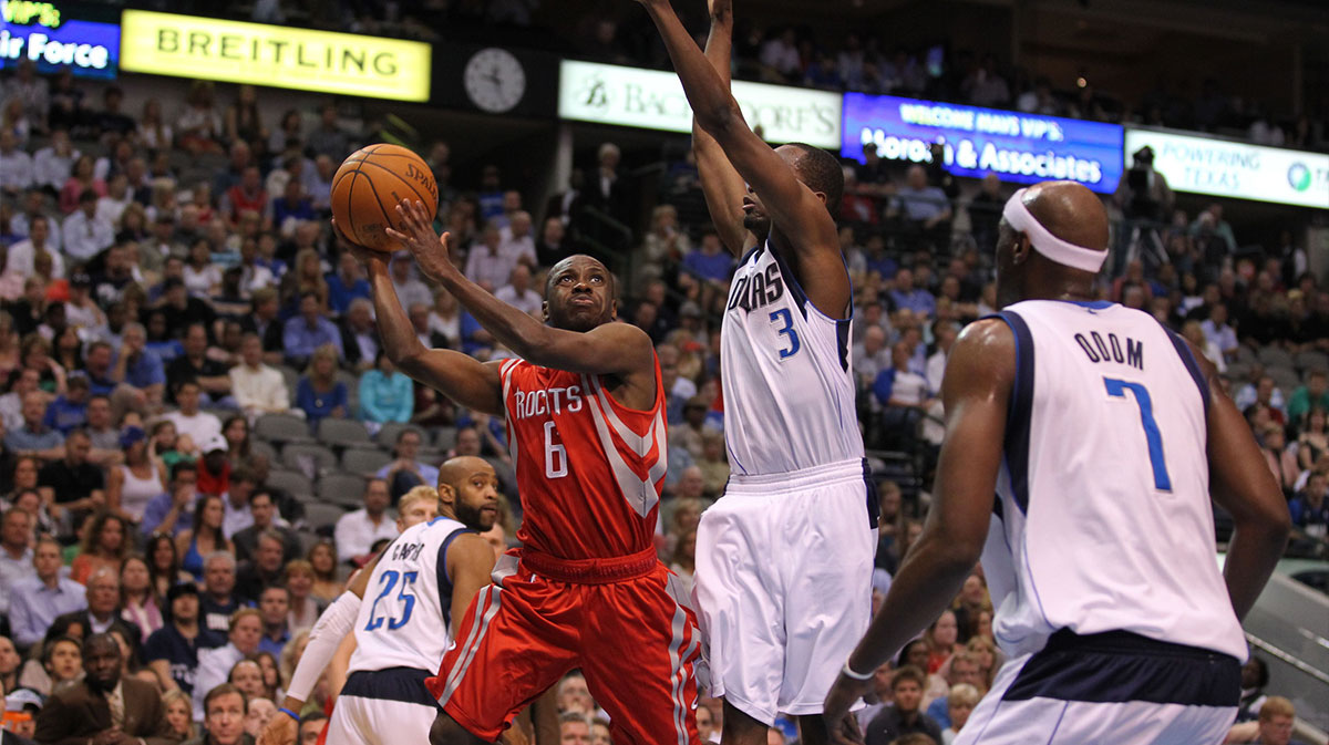 Houston Rockets guard Earl Boykins (6) shoots in the fourth quarter against the Dallas Mavericks at American Airlines Center. The Mavs beat the Rockets 90-81.