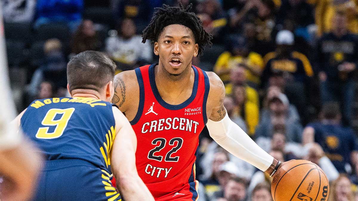 New Orleans Pelicans guard Elfrid Payton (22) dribbles the ball while Indiana Pacers guard T.J. McConnell (9)defends in the first half at Gainbridge Fieldhouse.
