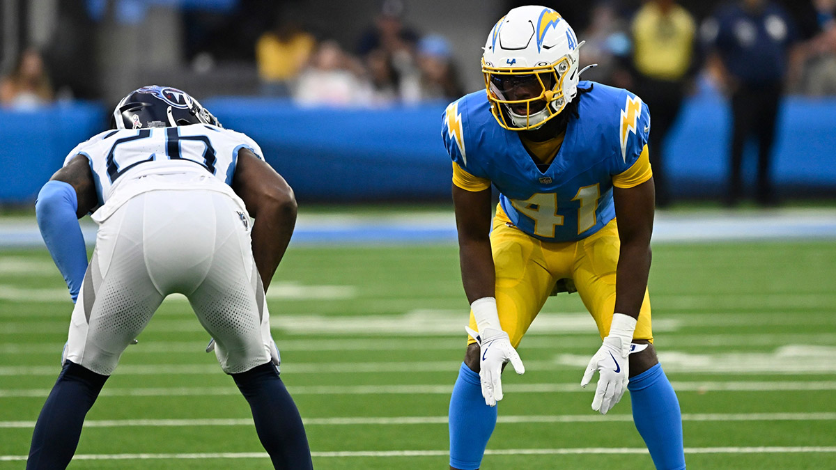 Los Angeles Chargers cornerback Eli Apple (41) and Tennessee Titans cornerback Justin Hardee Sr. (26) during the fourth quarter at SoFi Stadium.