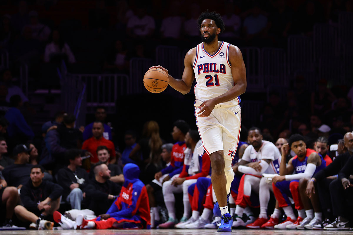 Philadelphia 76ers center Joel Embiid (21) dribbles the basketball against the Miami Heat during the fourth quarter at Kaseya Center.