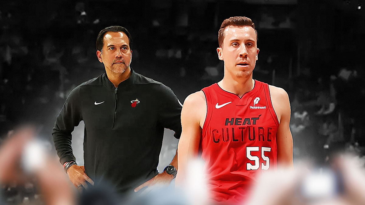 Miami Heat star Duncan Robinson and Erik Spoelstra in front of Kaseya Center.