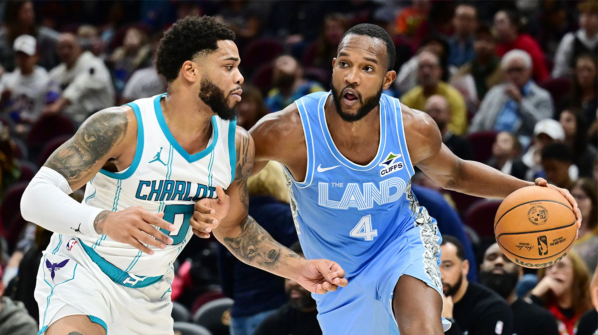 Cleveland Cavaliers forward Evan Mobley (4) drives to the basket against Charlotte Hornets forward Miles Bridges (0) during the second half at Rocket Mortgage FieldHouse.