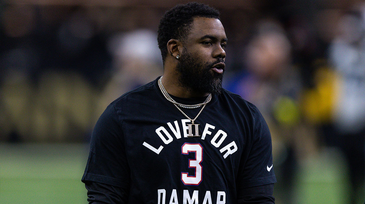 New Orleans Saints running back Mark Ingram II (22) wearing a Love for Damar shirt to show support for Buffalo Bills injured player Damar Hamlin after the game against the Carolina Panthers at Caesars Superdome