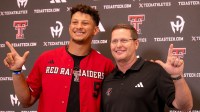 Kansas City Chiefs quarterback Patrick Mahomes and Texas Tech director of athletics Kirby Hocutt pose for a photo following a press conference at Jones AT&T Stadium, Friday, August 23, 2024.