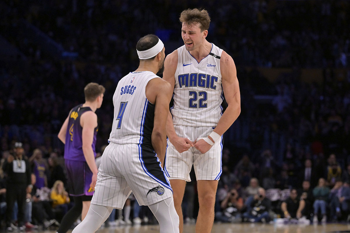 Orlando Magic forward Franz Wagner (22) celebrates with guard Jalen Suggs (4) after defeating the Los Angeles Lakers with a 3-point basket with 2.5 seconds left in the game at Crypto.com Arena.