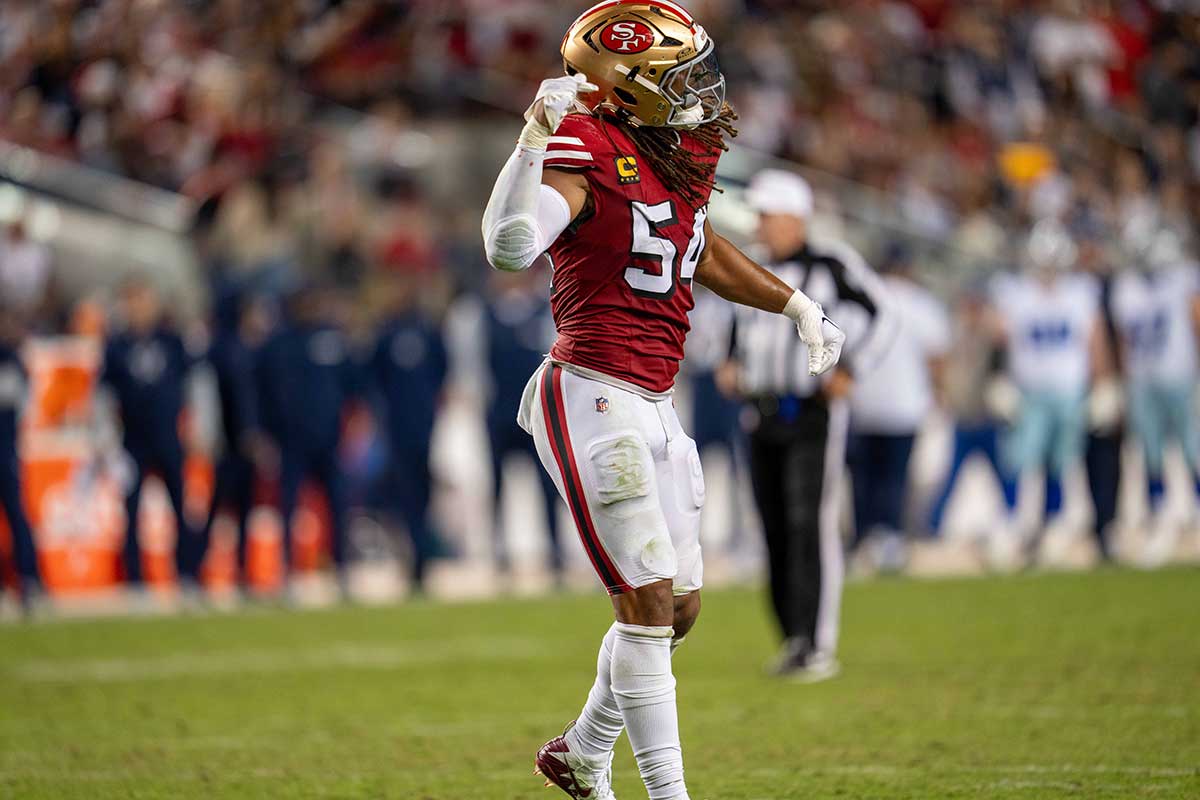 San Francisco 49ers linebacker Fred Warner (54) celebrates after Dallas Cowboys were stopped at the line of scrimmage during the fourth quarter at Levi's Stadium.