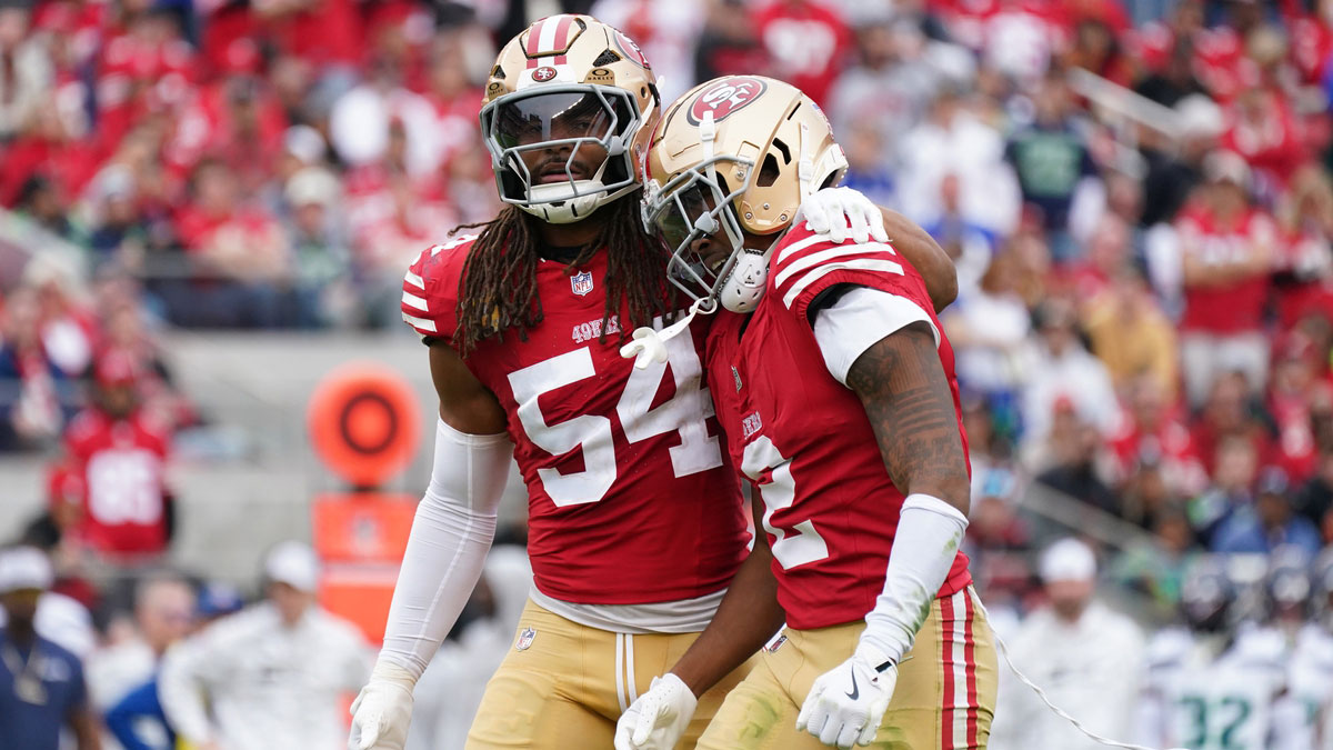 San Francisco 49ers linebacker Fred Warner (54) calms down San Francisco 49ers cornerback Deommodore Lenoir (2) after offsetting penalties against the Seattle Seahawks in the second quarter at Levi's Stadium.