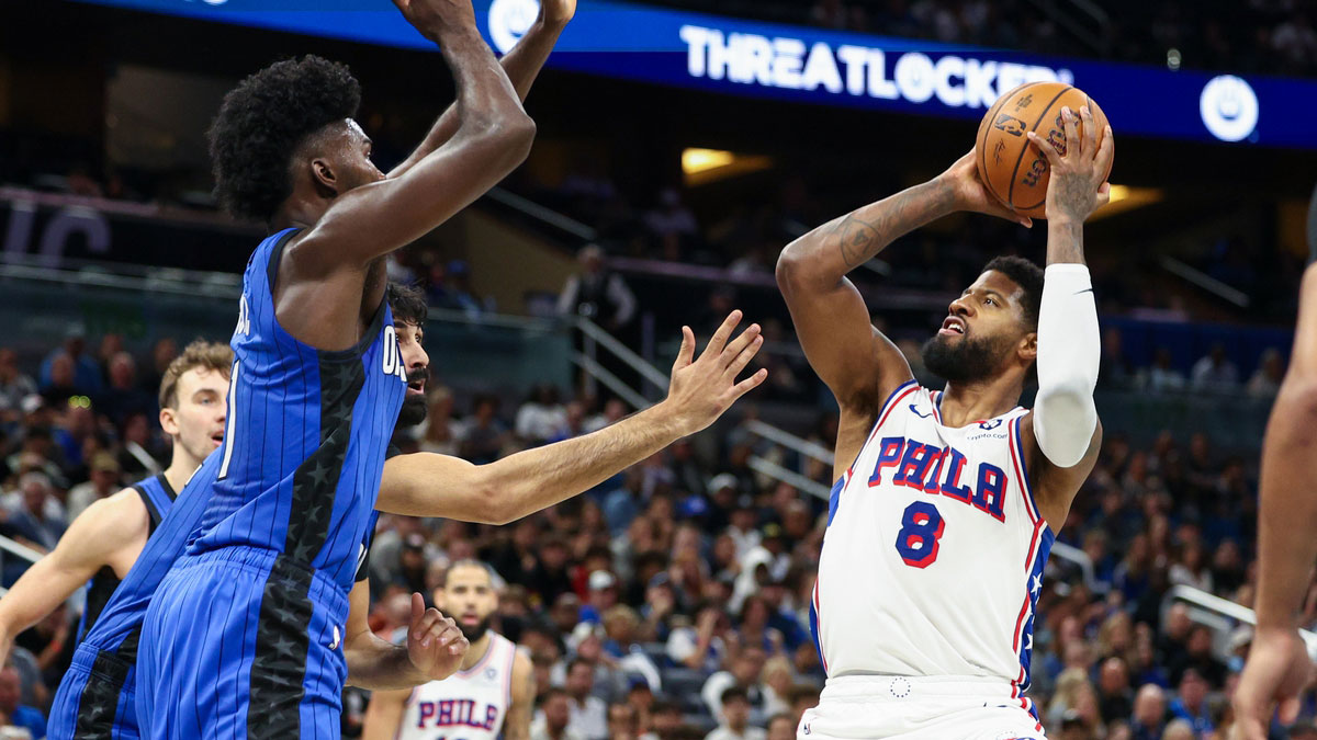 Philadelphia 76ers forward Paul George (8) shoots the ball against the Orlando Magic in the second quarter at Kia Center.
