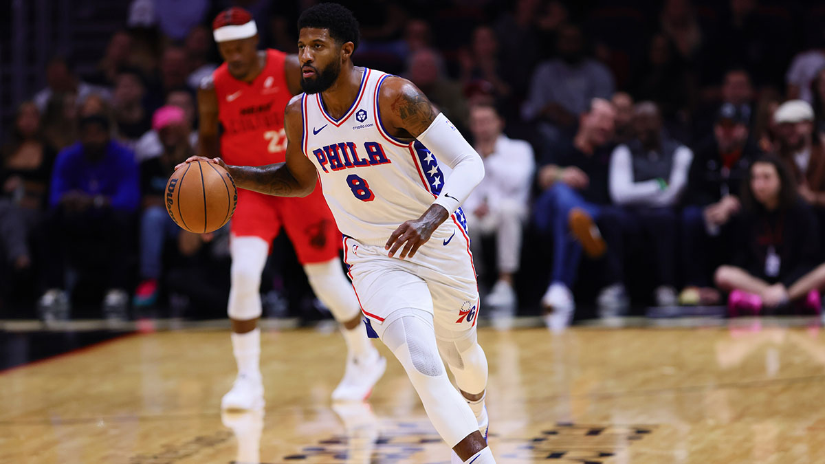 Philadelphia 76ers forward Paul George (8) dribbles the basketball against the Miami Heat during the first quarter at Kaseya Center.