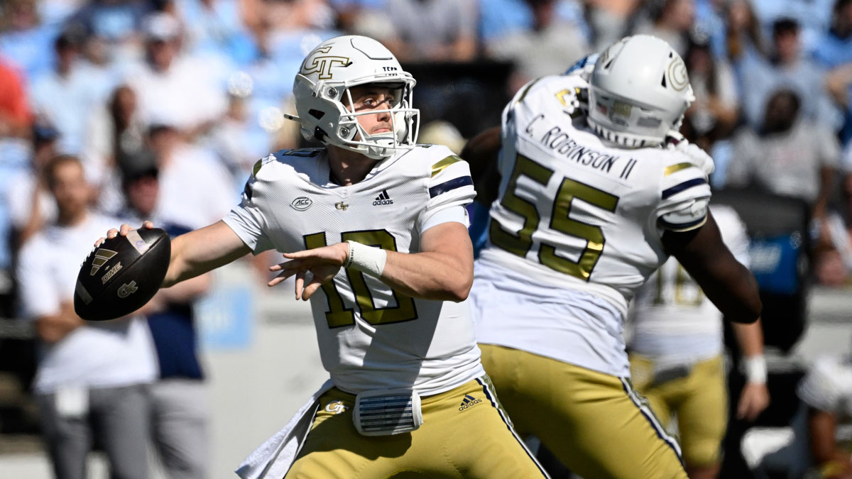 Yellow Jackets quarterback Haynes King (10) looks to pass in the first quarter at Kenan Memorial Stadium