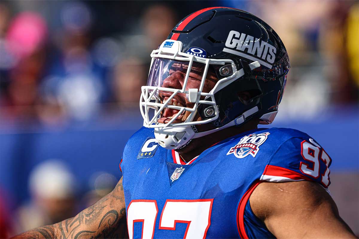 New York Giants defensive tackle Dexter Lawrence II (97) reacts during introductions before the game against the Washington Commanders at MetLife Stadium