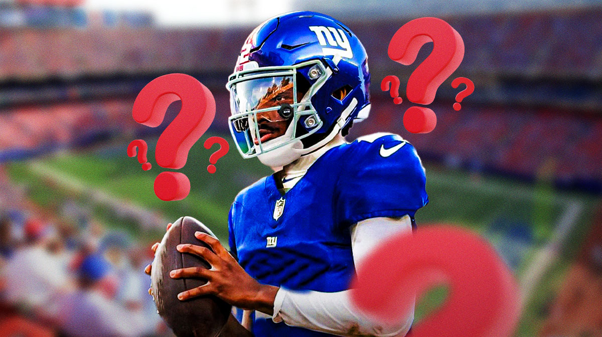 Shedeur Sanders in a photoshopped New York Giants jersey with question marks around him without a number on it, and a background of the Giants stadium.