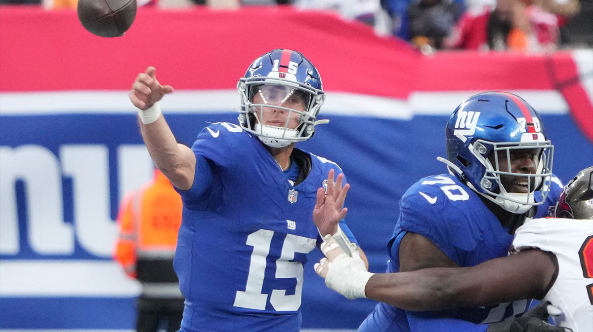 New York Giants quarterback Tommy DeVito (15) throws against the Tampa Bay Buccaneers during the second half at MetLife Stadium.