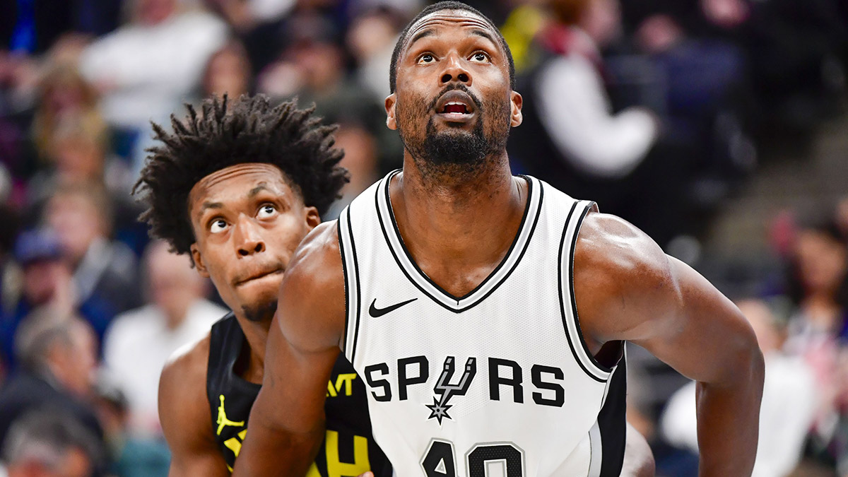 San Antonio Spurs forward Harrison Barnes (40) and Utah Jazz guard Collin Sexton (2) battle for position during a free throw shot during the first half at the Delta Center. Harrison Barnes also reflected on the Spurs' recent loss to the Lakers.