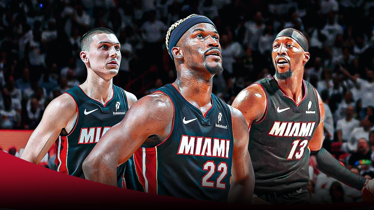 Miami Heat star Jimmy Butler in the middle of Tyler Herro and Bam Adebayo in front of Kaseya Center.