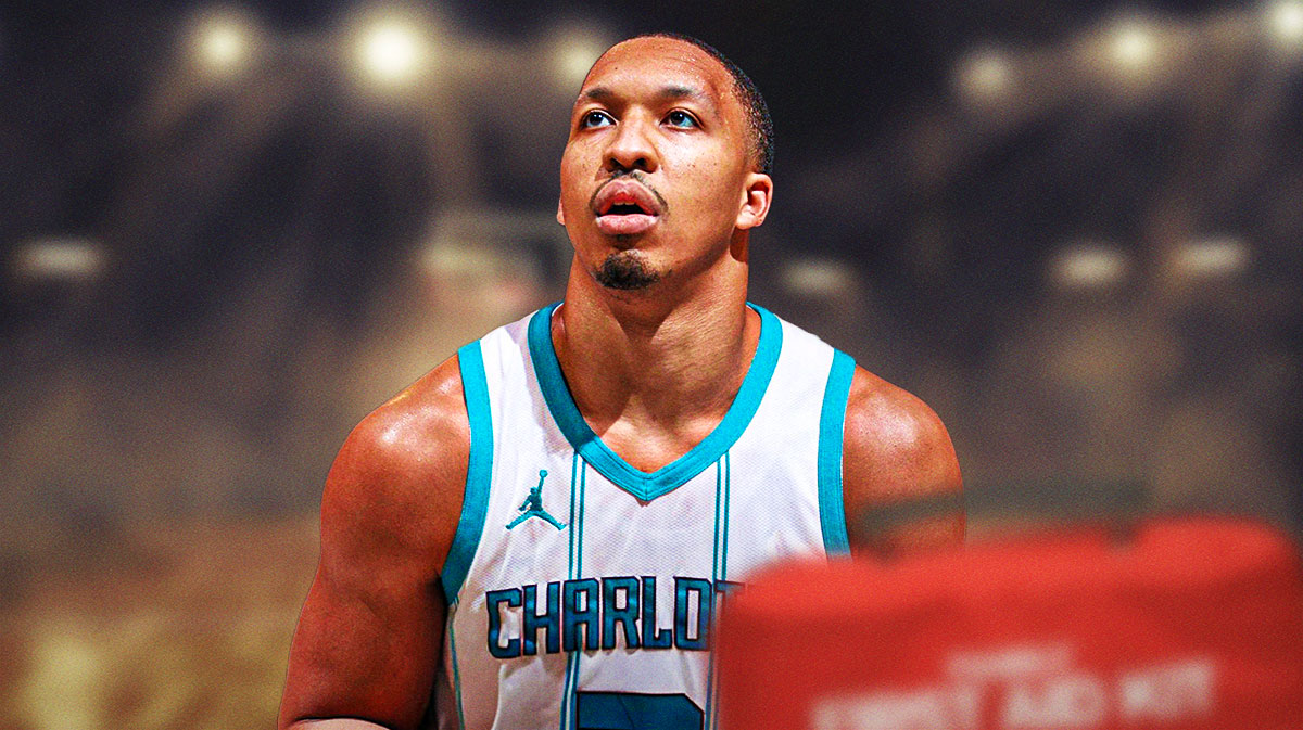 Grant Williams in a Hornets jersey with a first-aid kit.