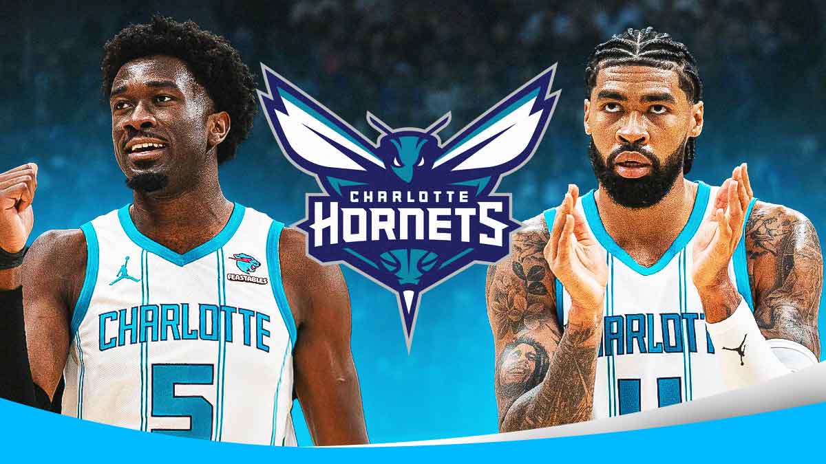 Mark Williams and Nick Richards next to a Hornets logo