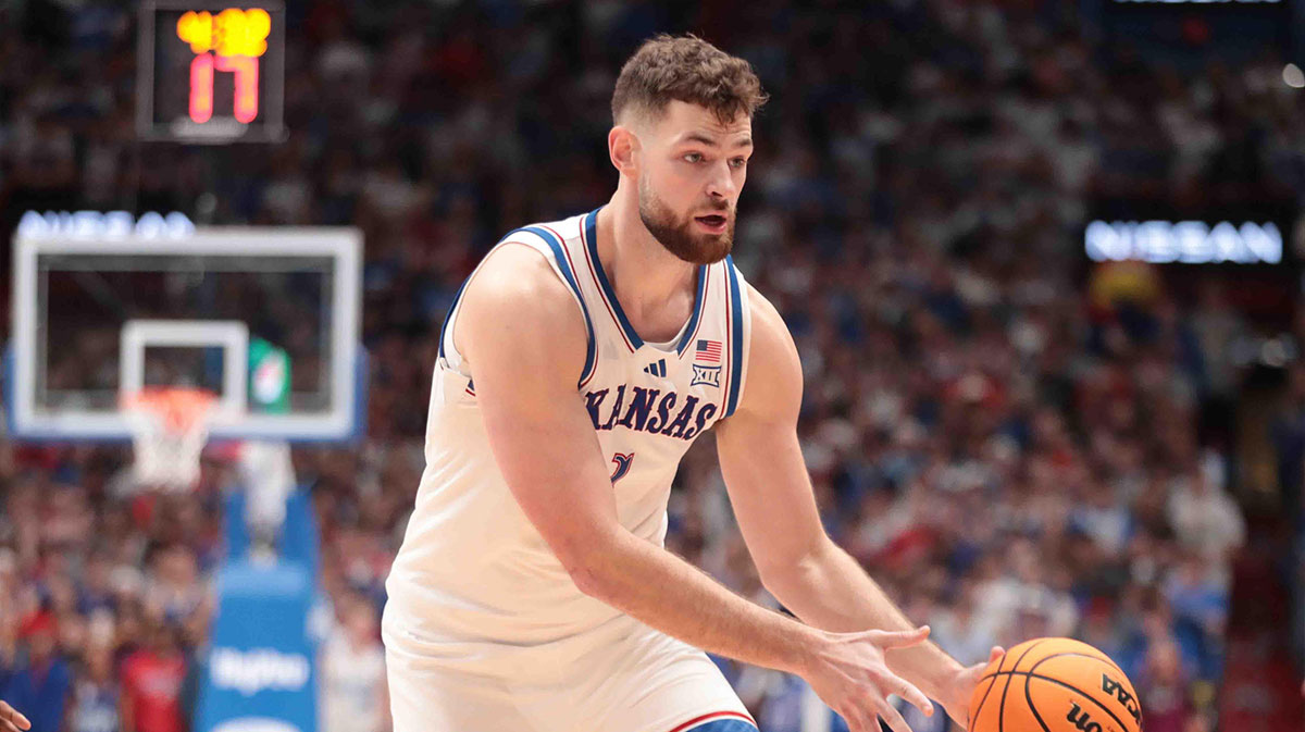 Kansas Jayhawks center Hunter Dickinson (1) passes the ball in the first half of the game against North Carolina Tar Heels inside Allen Fieldhouse Friday, Nov. 8, 2024.