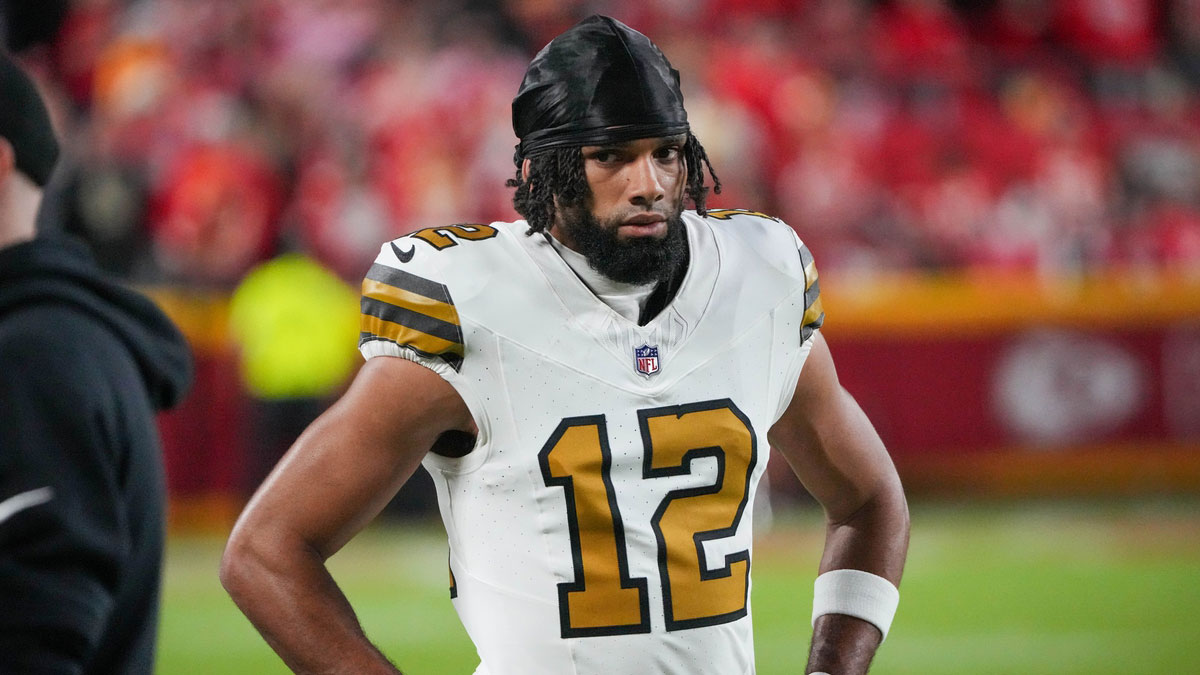 New Orleans Saints wide receiver Chris Olave (12) on the sidelines against the Kansas City Chiefs during the game at GEHA Field at Arrowhead Stadium.