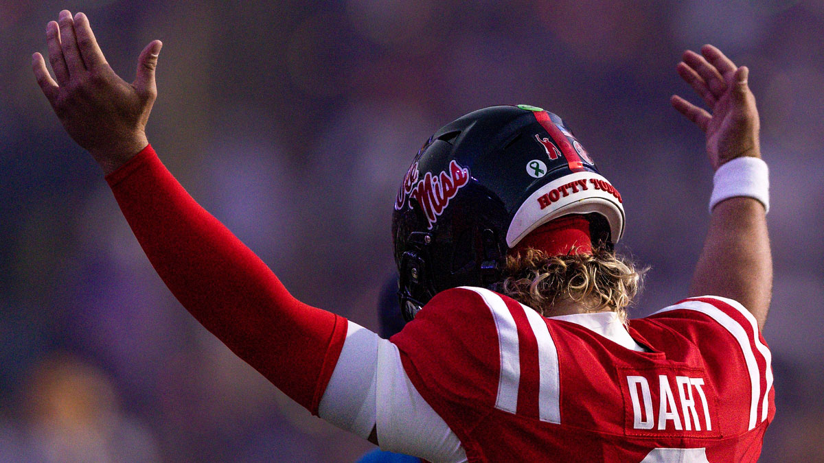 Mississippi Rebels quarterback Jaxson Dart (2) walks on the field against the LSU Tigers during the first half at Tiger Stadium.