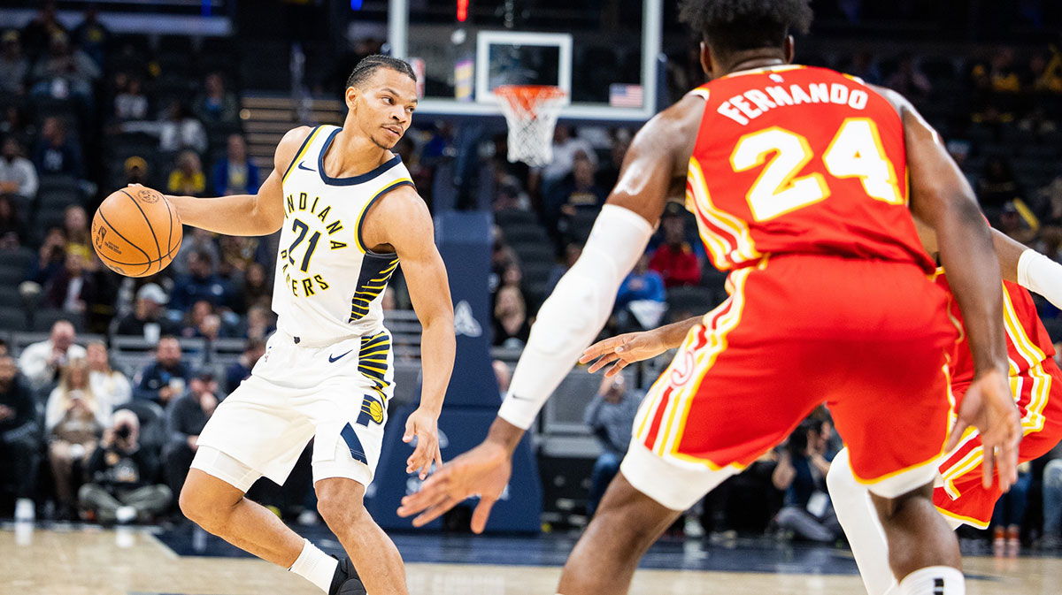 Indiana Pacers guard Isaiah Wong (21) dribbles the ball in the second half against the Atlanta Hawks at Gainbridge Fieldhouse.