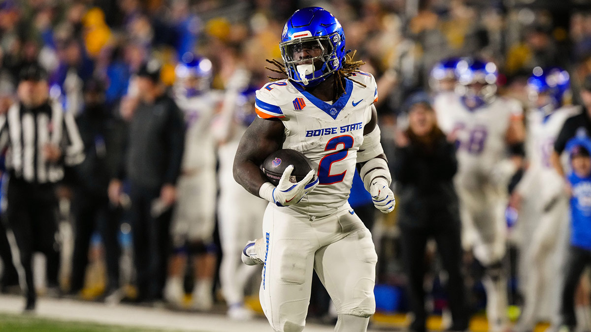 Nov 23, 2024; Laramie, Wyoming, USA; Boise State Broncos running back and Heisman Trophy candidate Ashton Jeanty (2) runs for a touchdown against the Wyoming Cowboys during the first quarter at Jonah Field at War Memorial Stadium.
