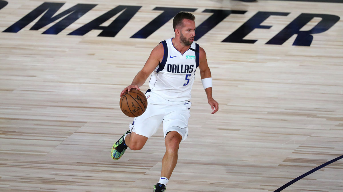 Dallas Mavericks guard J.J. Barea (5) brings the ball upcourt against the Sacramento Kings during the first half of a NBA basketball game in the HP Field House at the ESPN Wide World of Sports Complex.