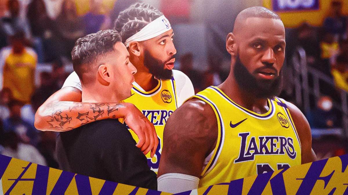 JJ Redick with LeBron James and Anthony Davis behind him