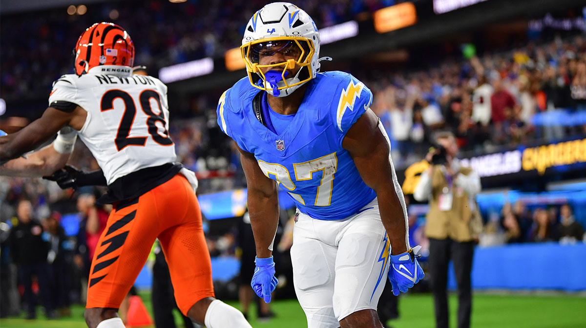 Los Angeles Chargers running back J.K. Dobbins (27) celebrates his touchdown scored against the Cincinnati Bengals during the second half at SoFi Stadium. 