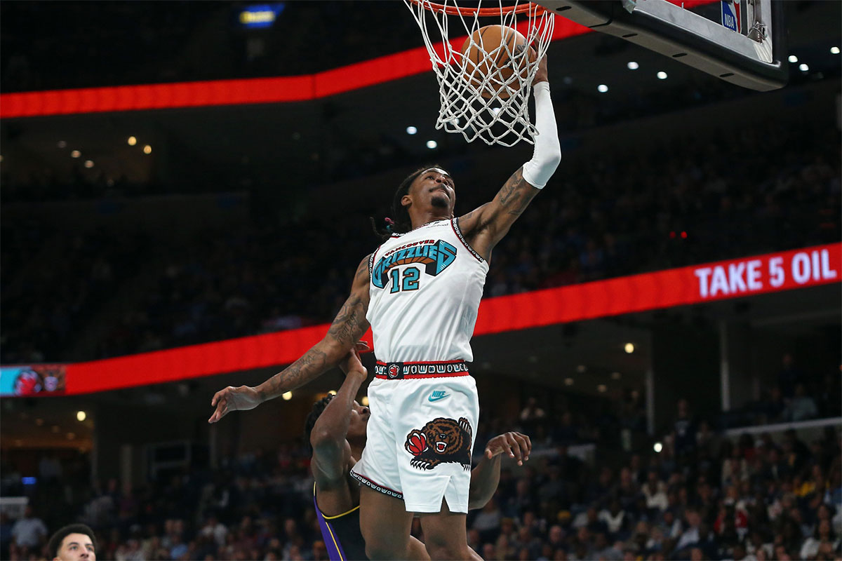 Memphis Grizzlies guard Ja Morant (12) drives to the basket during the second half against the Los Angeles Lakers at FedExForum.