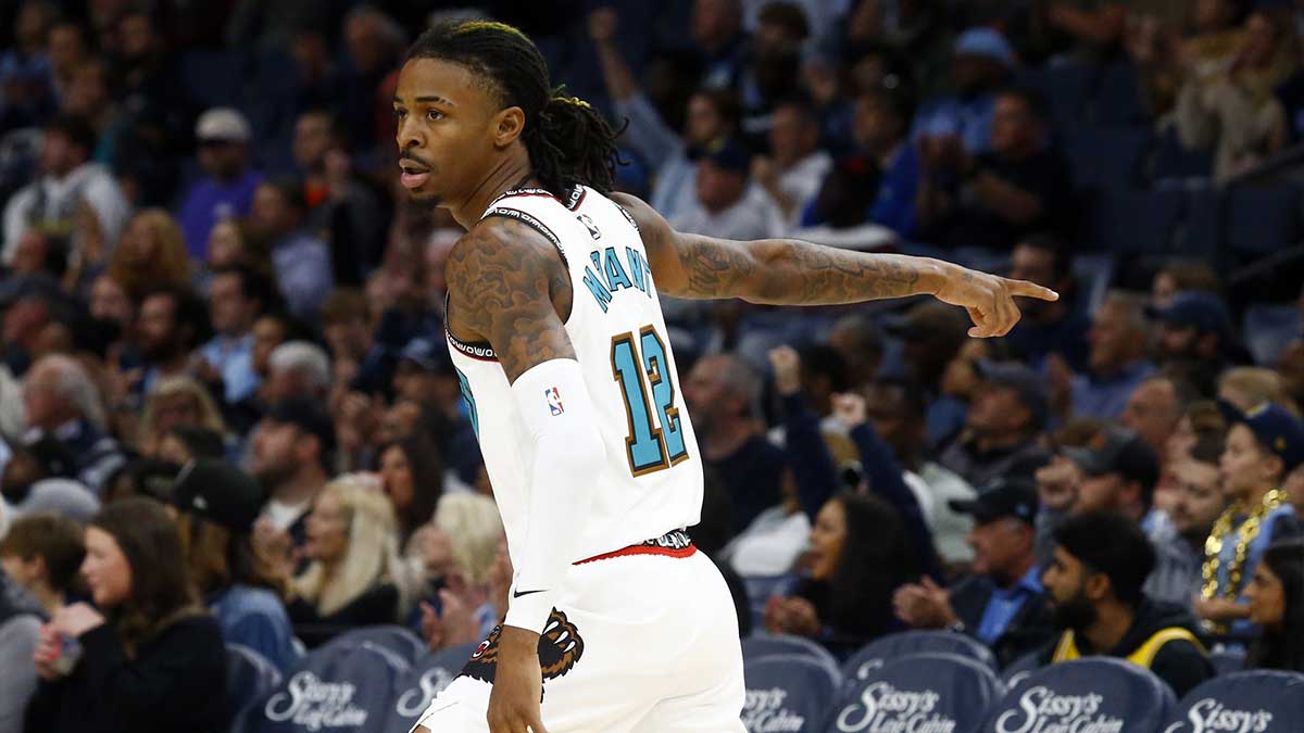 Memphis Grizzlies guard Ja Morant (12) reacts during the first half against the Los Angeles Lakers at FedExForum.