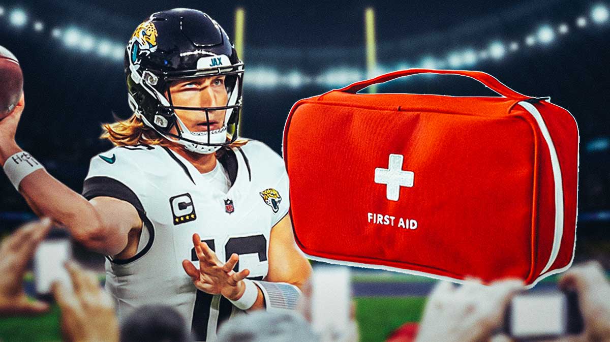 Photo: Trevor Lawrence in action in Jaguars jersey with medical kits beside him