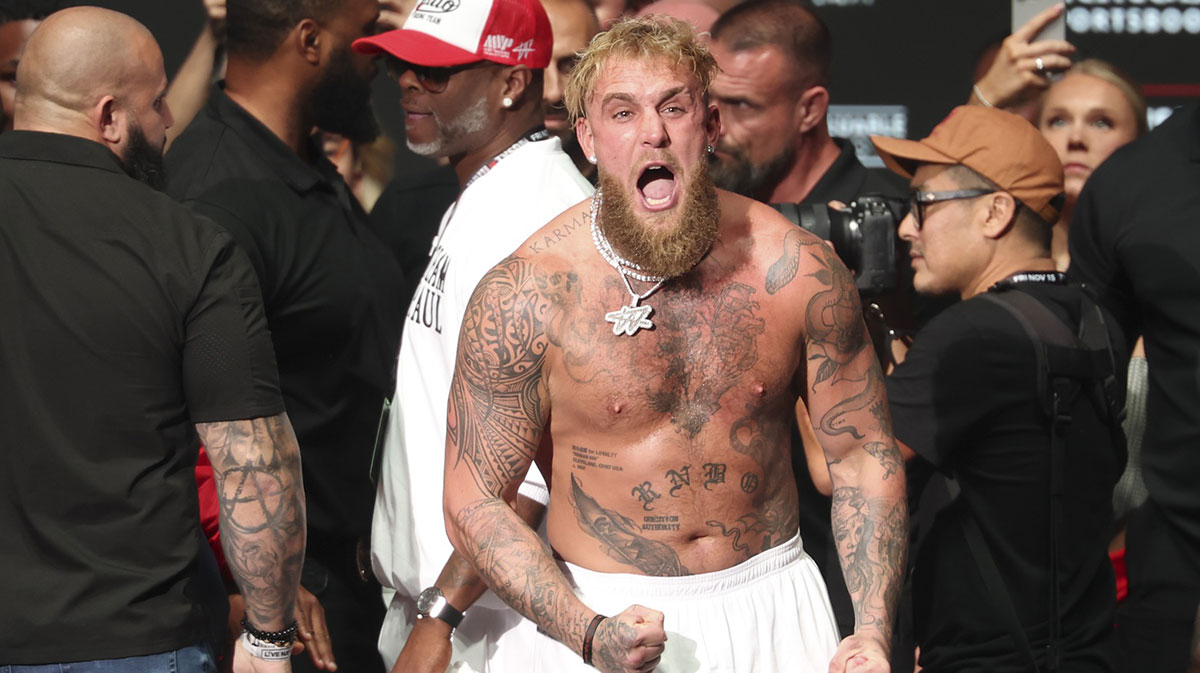Jake Paul reacts after being slapped by Mike Tyson (not pictured) after the weigh-in at the Toyota Music Factory.