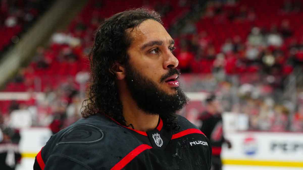 Carolina Hurricanes defenseman Jalen Chatfield (5) looks on before the game during the warmups against the Washington Capitals at Lenovo Center.