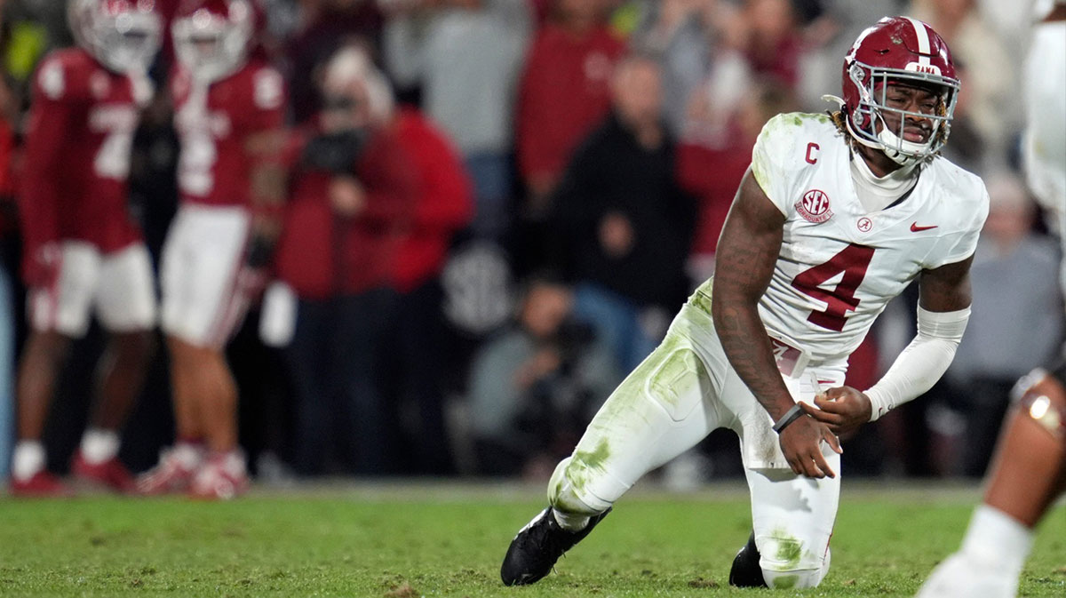 Alabama Crimson Tide quarterback Jalen Milroe (4) gets up after throwing an interception during a college football game between the University of Oklahoma Sooners (OU) and the Alabama Crimson Tide at Gaylord Family - Oklahoma Memorial Stadium in Norman, Okla., Saturday, Nov. 23, 2024. Oklahoma won 24-3.