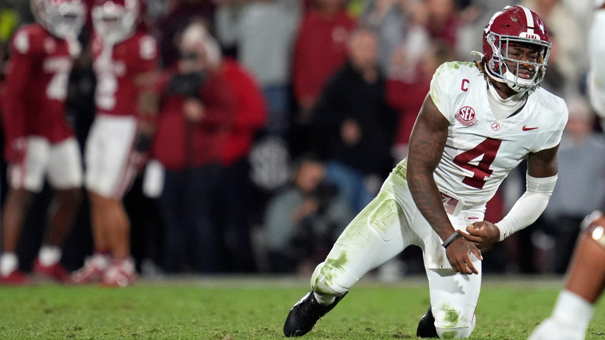 Alabama Crimson Tide quarterback Jalen Milroe (4) gets up after throwing an interception during a college football game between the University of Oklahoma Sooners (OU) and the Alabama Crimson Tide at Gaylord Family - Oklahoma Memorial Stadium in Norman, Okla., Saturday, Nov. 23, 2024. Oklahoma won 24-3.