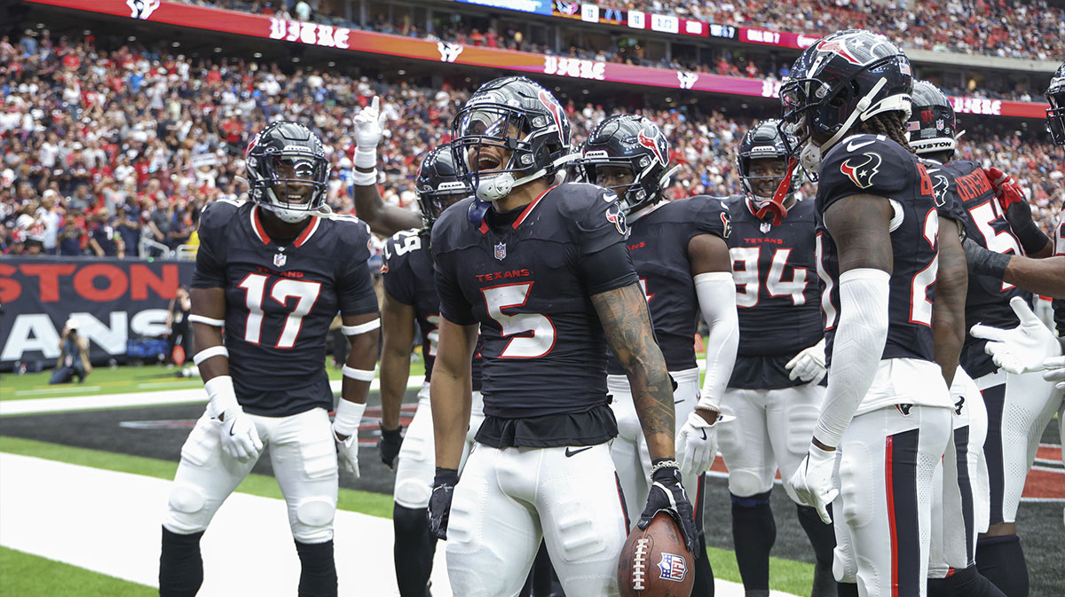 Houston Texans safety Jalen Pitre (5) celebrates after making an interception during the second quarter against the Indianapolis Colts at NRG Stadium.